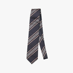 Full view of the Holliday & Brown Signature Stripe Tie in navy and blue, showing the classic striped pattern and refined silhouette.