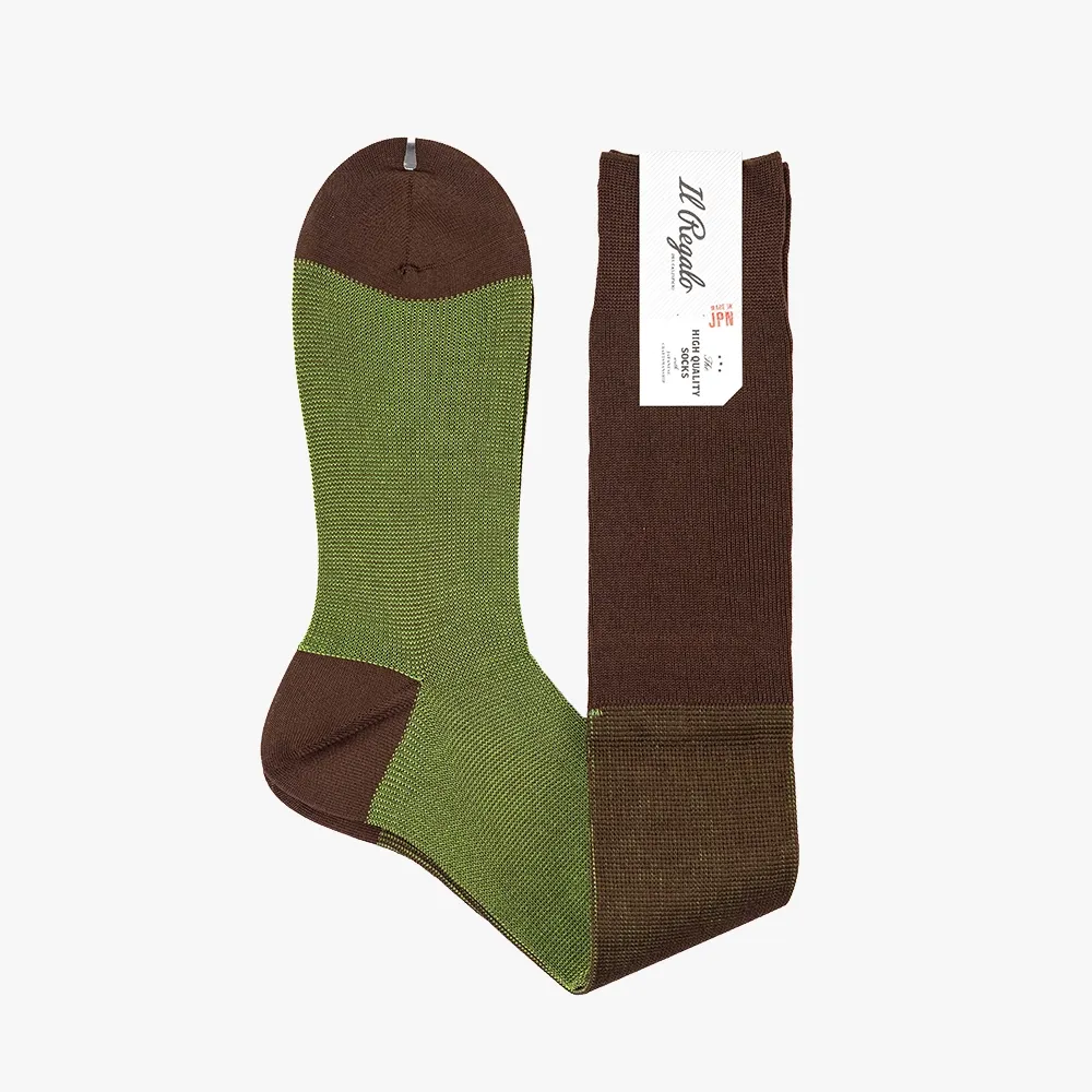 Side view showing the sock’s profile, rib structure, and length above the calf.