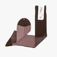 Side view of the Il Regalo Reversible Over The Calf Socks highlighting the rib knit pattern, contrasting heel and toe, and dual-color reversible design.