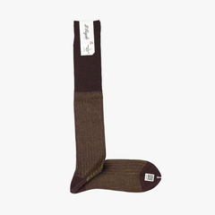 Full view of the Il Regalo Reversible Over The Calf Socks in Chocolate & Pistachio showing the elongated silhouette, rib-knit texture, and reversible two-tone design.