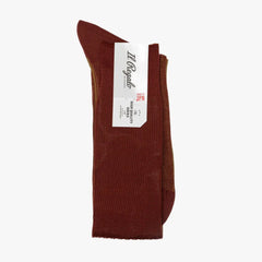 Side view of the Il Regalo Reversible Over The Calf Socks highlighting the rib knit pattern, contrasting heel and toe, and reversible color detail.