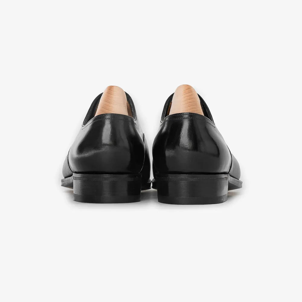 John Lobb Philip II Oxford in black calf leather, back view highlighting heel and stitching.