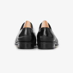John Lobb Philip II Oxford in black calf leather, back view highlighting heel and stitching.