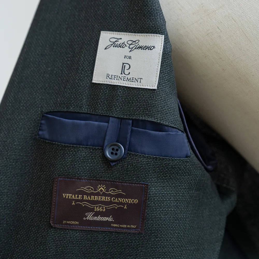 Inner brand label of the Justo Gimeno Teba Jacket Hopsack by VBC Green