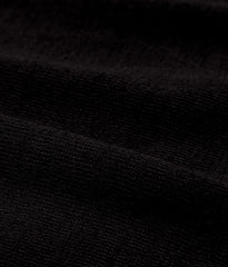 Close-up of the ice cotton knit fabric showing its cool-touch texture, tight weave, and matte black appearance.