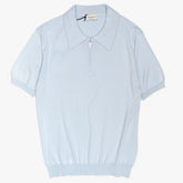 Front view of the Morgano zipped polo neck in cielo featuring a clean silhouette and refined knit construction with zip placket.