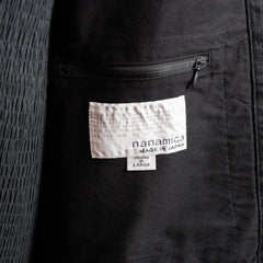 Close-up of the interior pocket showing functional detailing and inner construction.