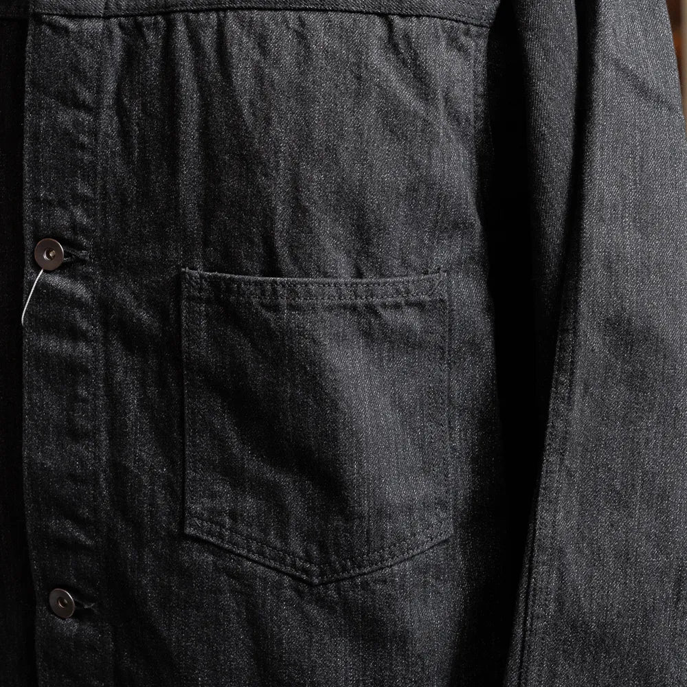 Close-up of the chest pocket showing stitching detail and panel construction.