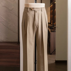 Front view of the Neat High Twisted Cotton Twill Standard trousers in beige showing wide leg silhouette and clean pleated front.