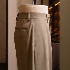 Side view of the trousers showing straight leg line and tailored proportions.
