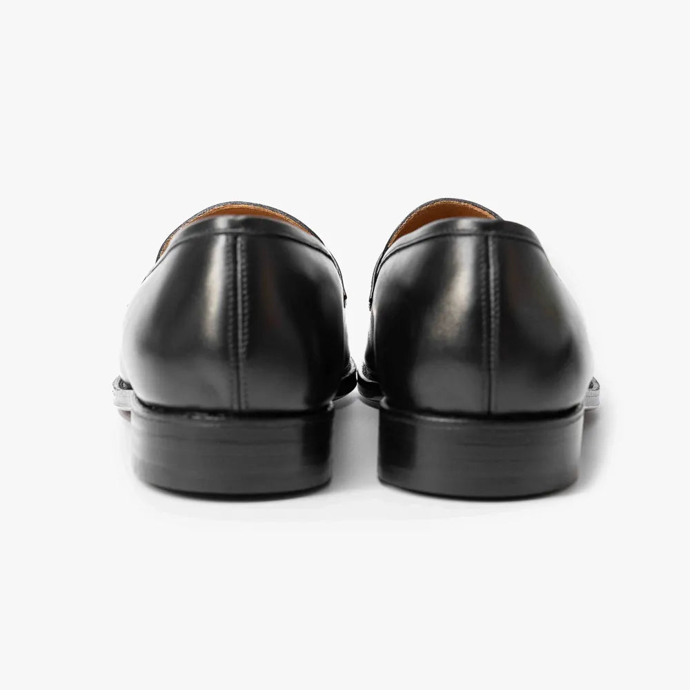 Oriental Albers Penny Loafer in black box calf leather, back view showing heel and welt.