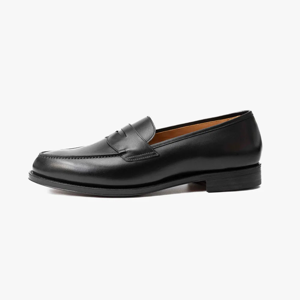 Oriental Albers Penny Loafer in black box calf leather, side profile highlighting clean lines.