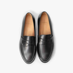 Oriental Albers Penny Loafer in black box calf leather, top view of pair with penny strap detail.