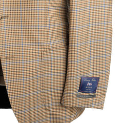 Close-up of the sleeve and hem area of the RMJ-03 Gunclub Windowpane Jacket highlighting sleeve buttons, stitching, and refined tailoring.