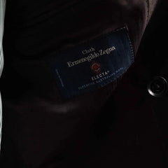 Close-up of the interior labels showing Refinement Made By Ring Jacket branding and the Ermenegildo Zegna Electa fabric label.