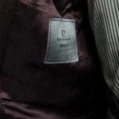 Close-up of the interior labels showing Refinement Made By Ring Jacket branding and the Ermenegildo Zegna Electa fabric label.