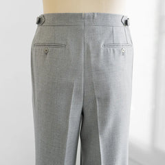 Back view highlighting the welt pockets, rear shaping, and smooth structure of the Airesco cloth.