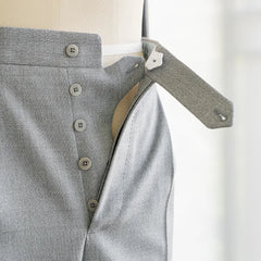 Close-up of the fly showing zipper, hook closure, and refined internal finishing.