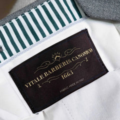 Close-up of the interior label showing Refinement and Drapers branding with clean inner finishing.