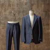 Full set view of the Refinement × Ring Jacket RMJ-03 Navy Suit by Dormeuil showing the jacket and trousers together with a refined tailored silhouette.