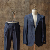 Full set view of the Refinement × Ring Jacket RMJ-03 Herringbone Suit Navy by VBC showing the jacket and trousers together with a clean tailored silhouette.