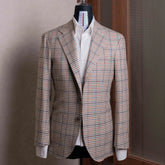 Front view of the Refinement Tailoring Rfmt-01 Sport Jacket Beige Gun Club by E. Thomas showing the classic sport coat silhouette, beige gun club pattern, and refined tailoring.
