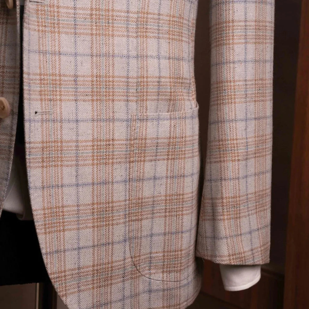 Close-up of the front pockets showing flap design, stitching accuracy, and perfect pattern matching.