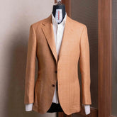 Front view of the Refinement Tailoring Rfmt-01 Sport Jacket Salmon Herringbone by E. Thomas showing the classic silhouette and warm salmon herringbone pattern.