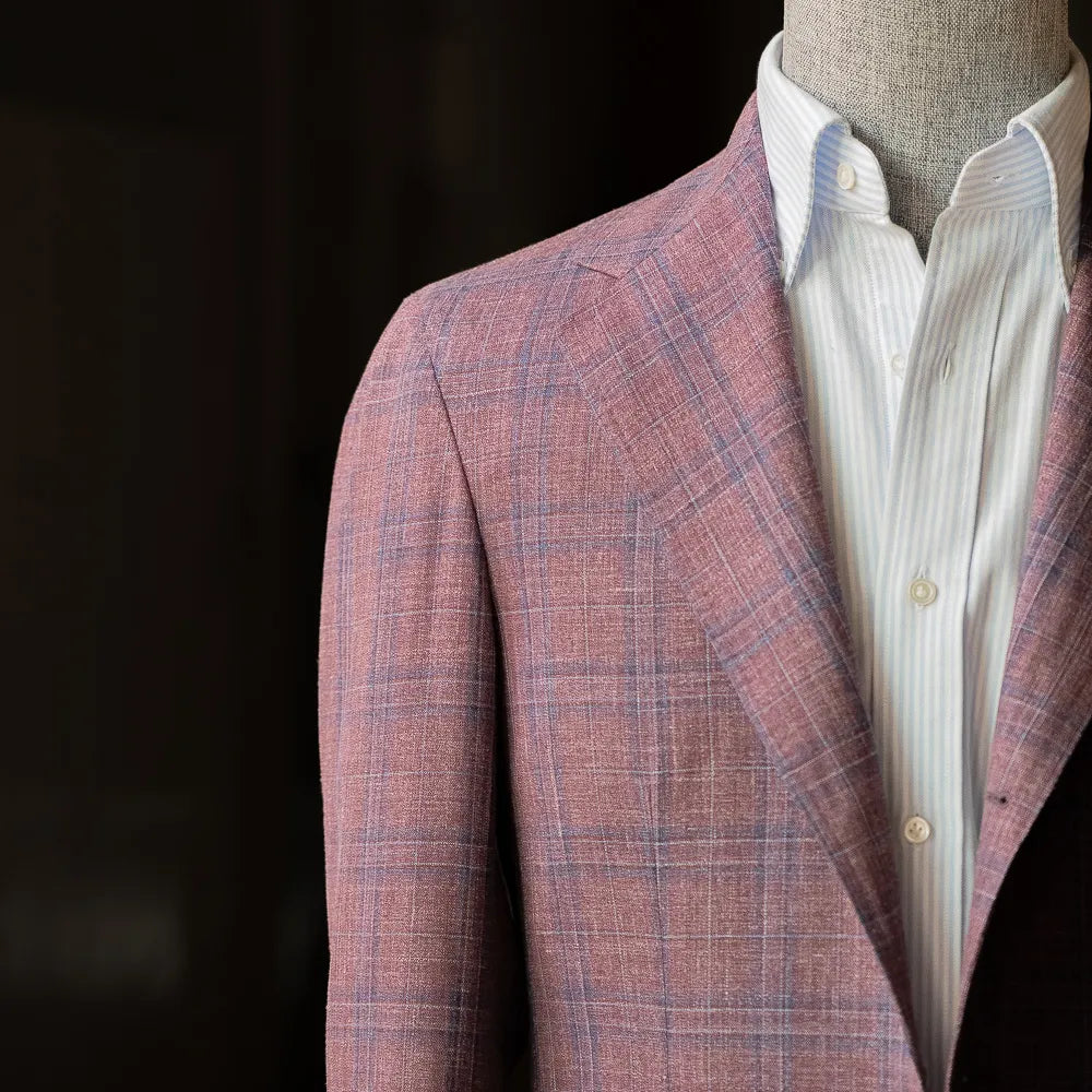 Upper-body close-up of the Summertime Checked Purple jacket highlighting the lapel roll, chest pocket, and lightweight Loro Piana fabric texture.