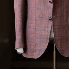 Side and sleeve detail of the Rfmt-01 jacket showing button stance, sleeve finishing, and the subtle checked pattern in Loro Piana Summertime cloth.
