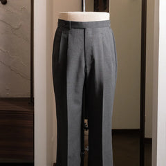 Front view of the grey trousers showing clean tailored silhouette.