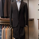 Front view of the Refinement Tailoring Rfmt-01 Suit Jacket Seersucker Black by Fratelli Tallia di Delfino showing the lightweight silhouette and textured black seersucker fabric.