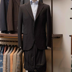 Front view of the Refinement Tailoring Rfmt-01 Suit Jacket Seersucker Black by Fratelli Tallia di Delfino showing the lightweight silhouette and textured black seersucker fabric.
