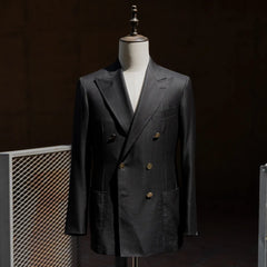 Full front view of the Refinement Tailoring Rfmt-02 double breasted sport jacket in black by Loro Piana showing structured silhouette and peak lapels.
