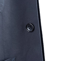 Close-up of the front buttons showing hardware detail, button shape, and placket construction.