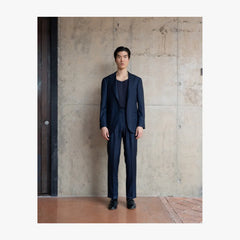 Full body view of RMJ-03 navy single breasted herringbone suit by Ring Jacket made with VBC fabric