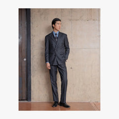 Full body view of RMJ-04 charcoal grey chalkstripe double breasted suit by Ring Jacket made with VBC fabric