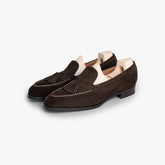Saint Crispin’s 642S tassel loafer in dark brown suede, angled front view showing hand-stitched apron.