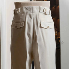 Rear view of the Tangent Tan 04° Charles Hard Twist Twill Off White trousers featuring the back pockets and clean drape.