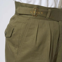Side profile of the Tangent TAN12 Arthur Military Green trousers highlighting the clean drape and refined shape.