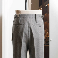 Side profile of the Tangent Tan 25° Wool Check Hound Tooth trousers highlighting the wool texture and clean drape.