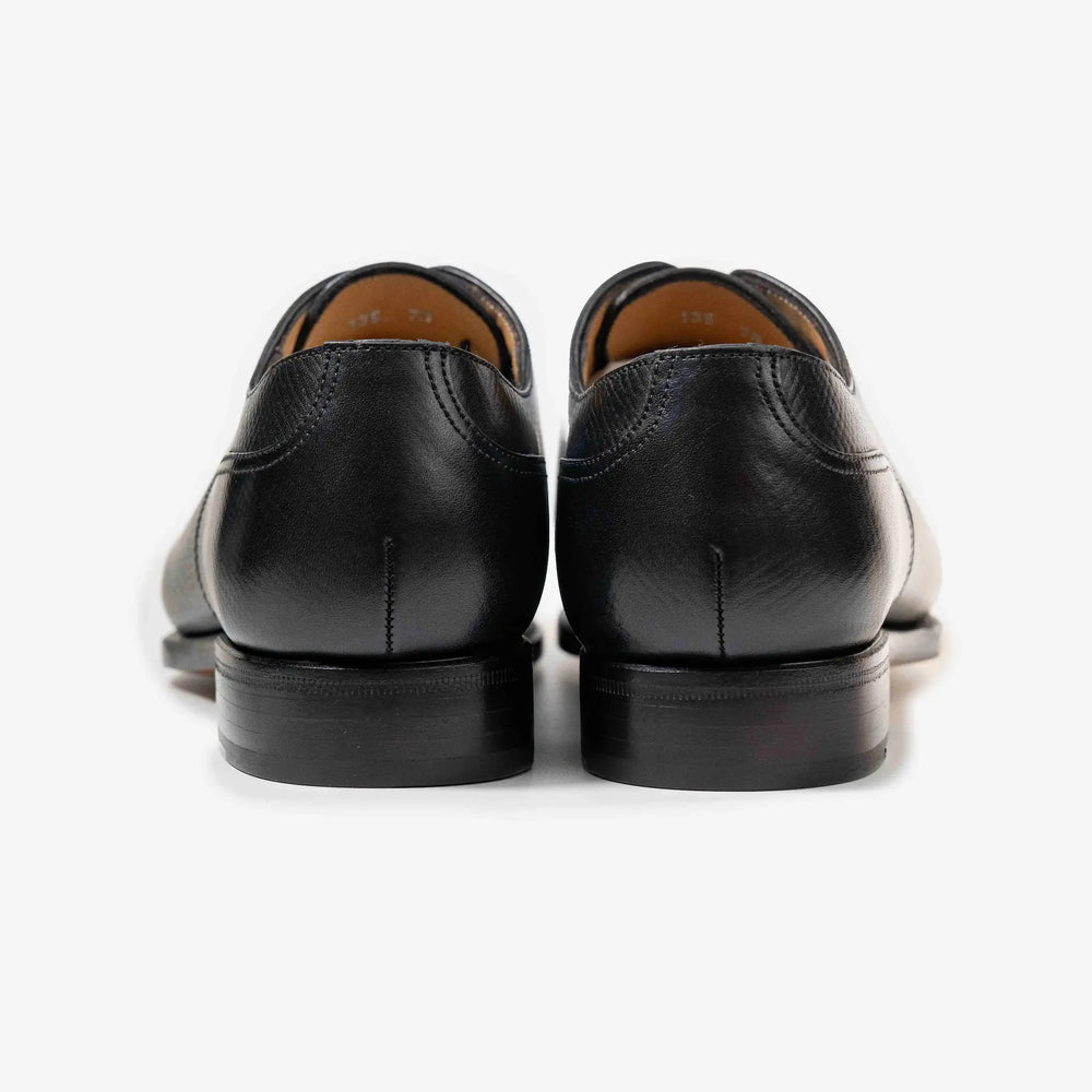 rear view of TLB Mallorca Artista 135 Velazquez Black with stacked leather heel