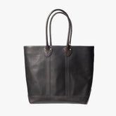 Front view of the Vasco x Refinement Leather Tote in black showing the structured silhouette, clean paneling, and premium leather finish.