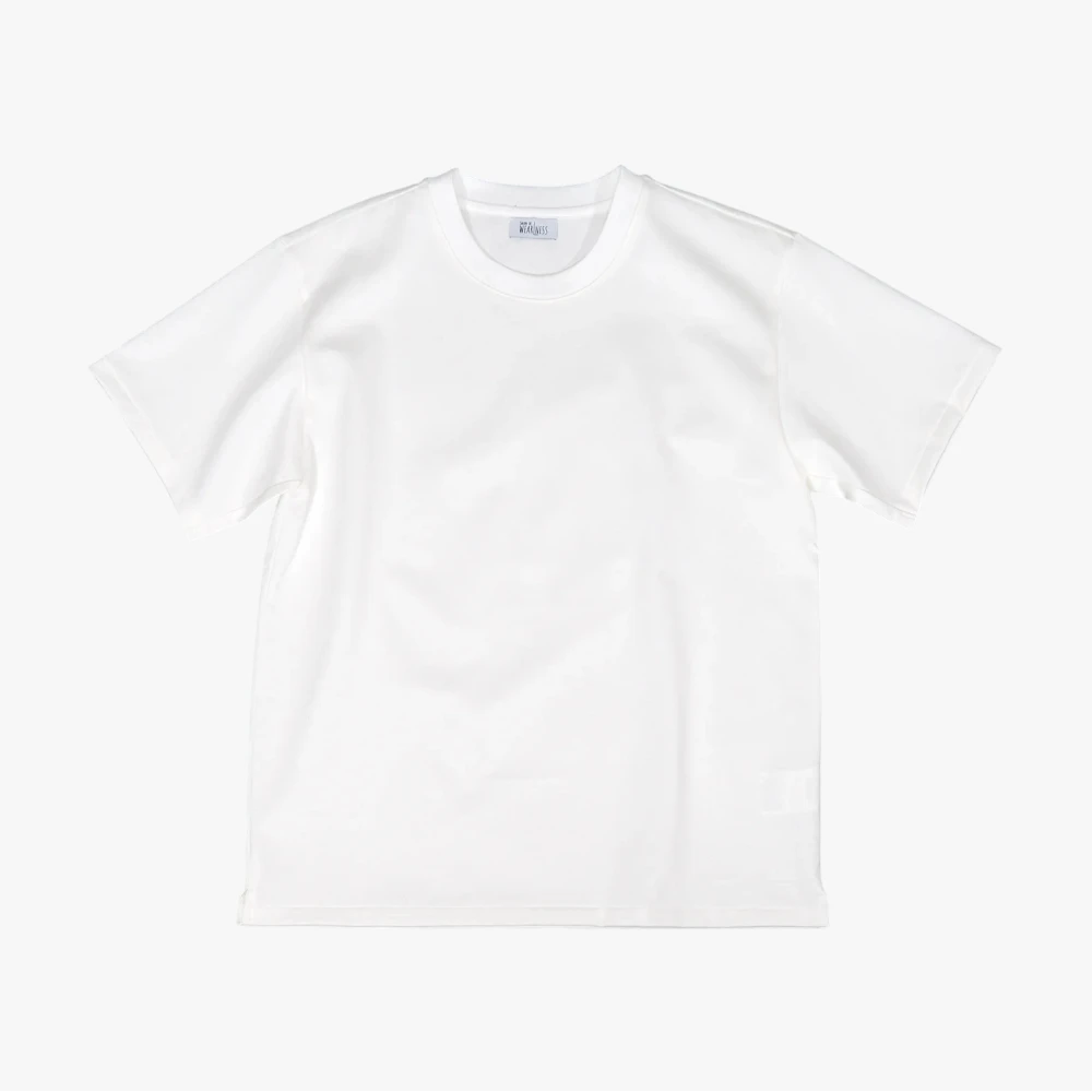 Front view of the Wearlness Fulfilled Dress T-shirts in White showing the clean, structured silhouette and minimalist design.