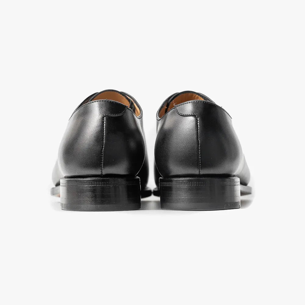 Close-up of the sole and heel showing craftsmanship, edge finishing, and durable construction.