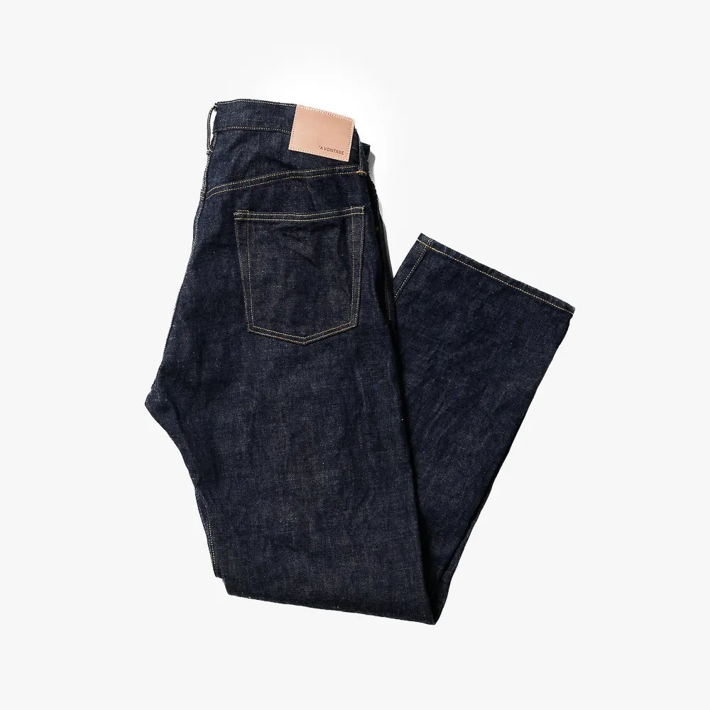 Close-up of the one-washed denim fabric showing texture, weave, and natural indigo tone.