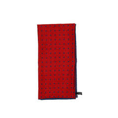 Folded view of the Adamley Bandana Small Poka Orange