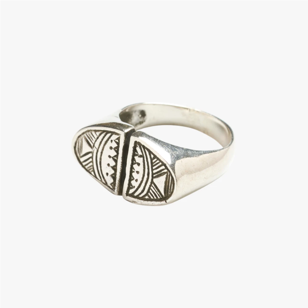 Close-up of the Agolid Ring highlighting engraved motifs, surface texture, and artisanal metalwork.