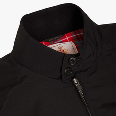 Close-up of the stand collar with two-button fastening detail.