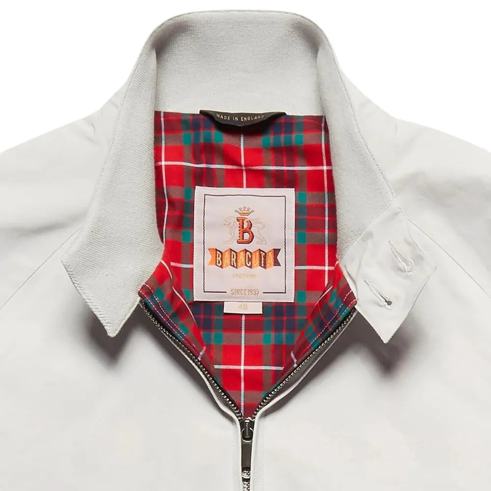 Close-up of the collar of the Baracuta G9 Harrington Jacket Mist showing the ribbed neckline and Fraser Tartan lining.